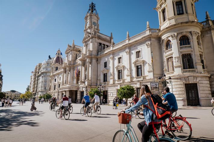 People cycling in Valencia city centre