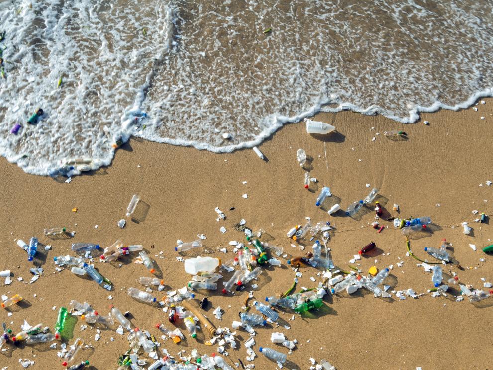 Aerial view of plastic pollution on a beach