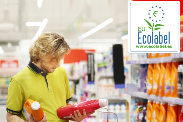 Man in supermarket looking at ecolabels on detergent bottles